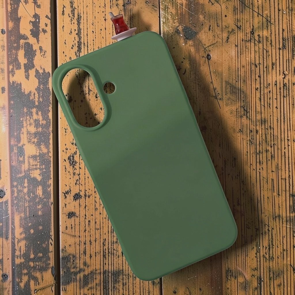 digitaley.co green silicone iPhone case with a miniature tea glass motif on top. Slim-waist design.