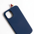 digitaley.co navy blue iPhone case with 3D miniature Turkish tea glass and saucer accessory.