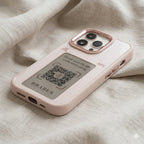 DigitaleyHub Smart-Ink NFC customizable photo iPhone case in light pink with E-Ink display showing a QR code.