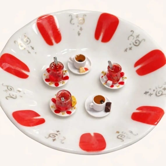 digitaley.co iPhone case with red tea glass motif, premium silicone, slim-waist design.