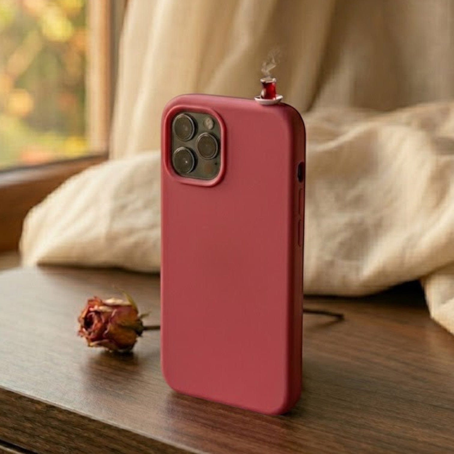 digitaley.co red silicone iPhone case with a miniature tea glass motif on top, offering slim-waist design and shock absorption.