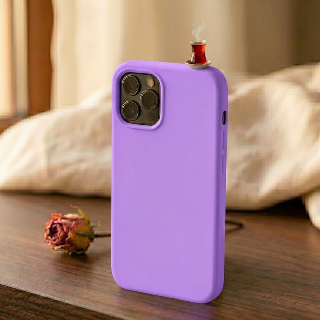 digitaley.co mustard yellow silicone iPhone case with a miniature steaming tea glass motif on top.