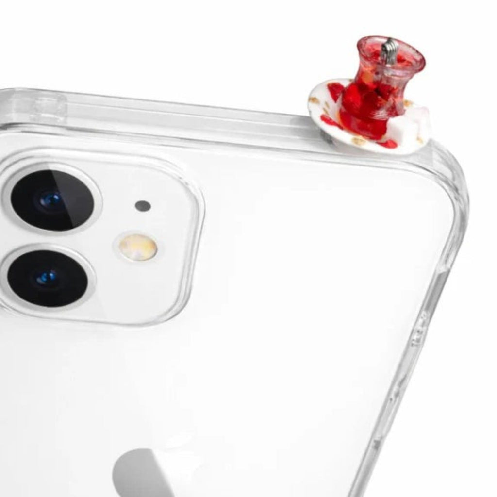 digitaley.co handmade miniature Turkish tea cup and saucer phone case accessory with red tea and sugar cubes.